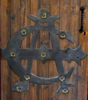 Canet de Mar - Ferratge de porta amb el simbol de l'Ateneu Canetenc